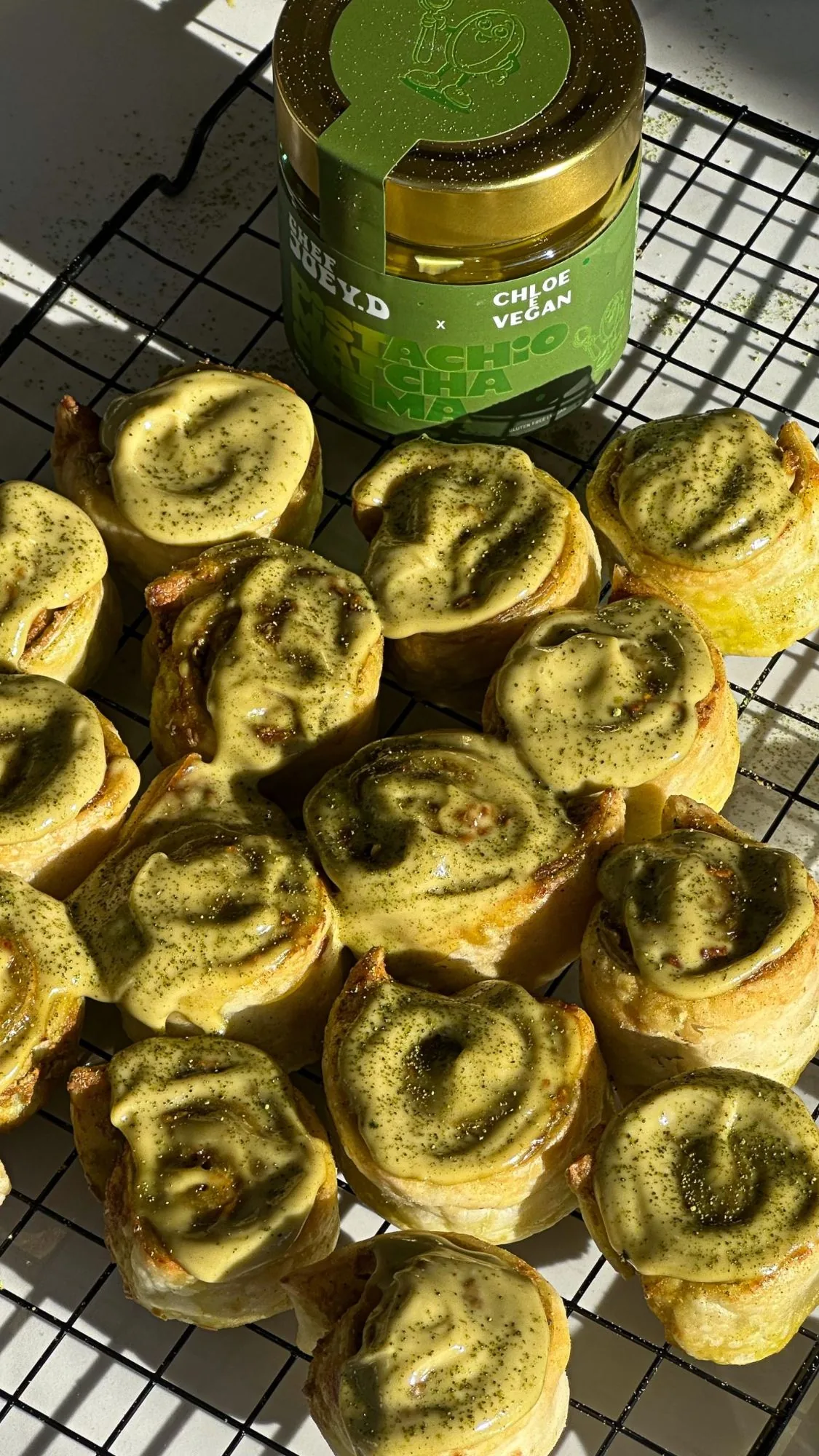 Pistachio Matcha Crema pastry rolls styled with the jar