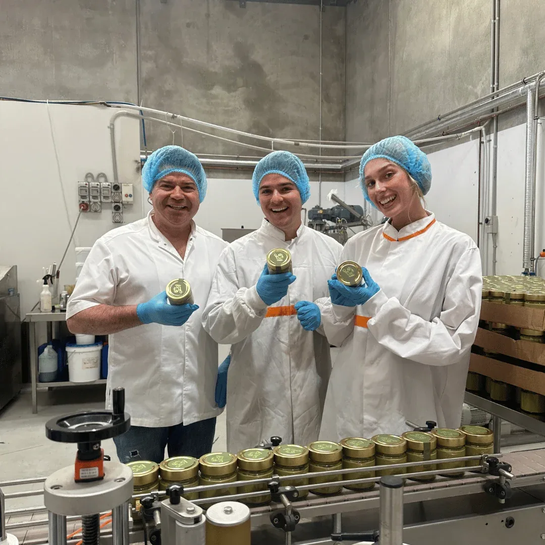Chef Joey D and the production team packing Pistachio Matcha Crema jars